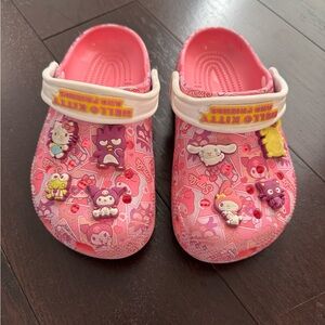 CROCS Pink Clogs with Fun Charms